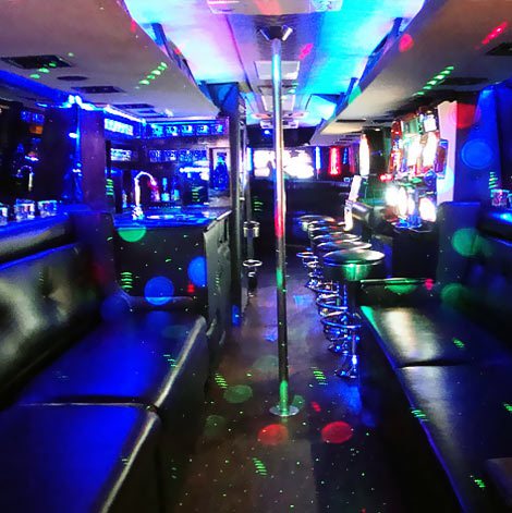 Leather seats and built-in bar on a 40 passenger Limo Party Bus